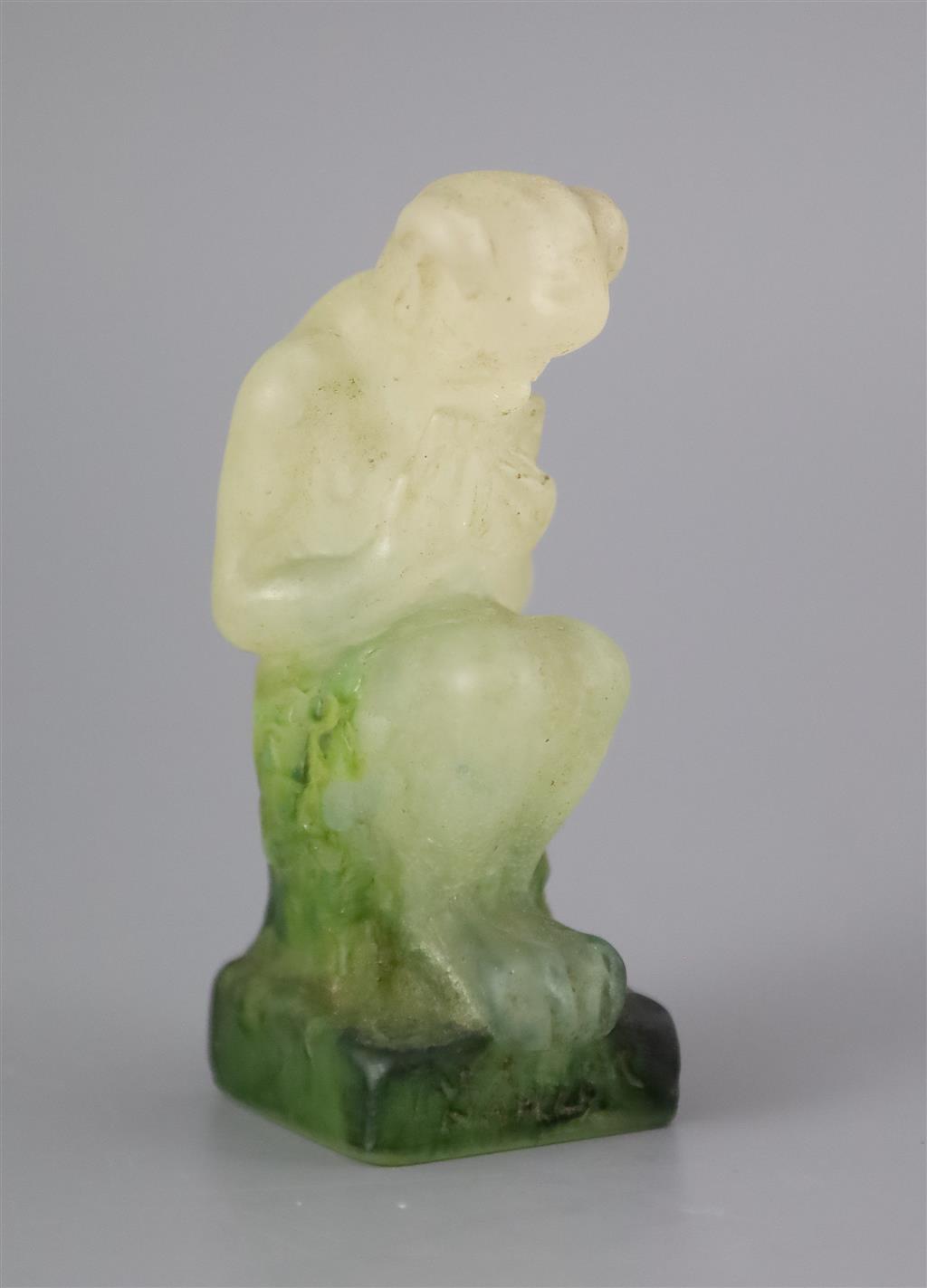 An Amalric Walter pate de verre seated figure of Pan, 9.2cm high